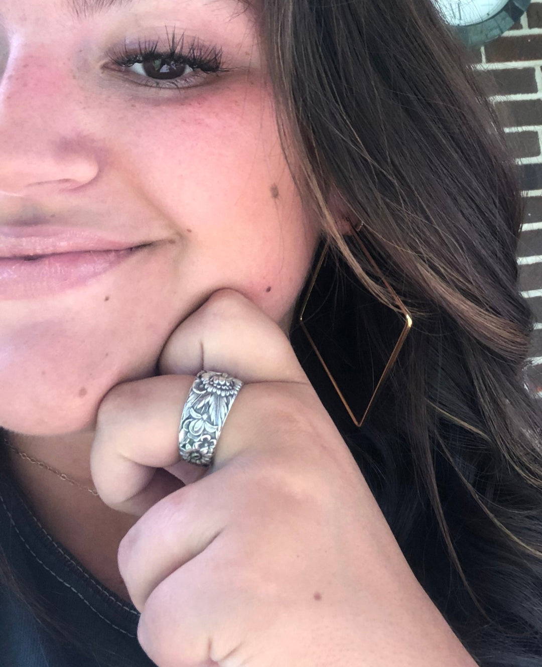 Customer wearing spoon ring made from family heirloom silverware
