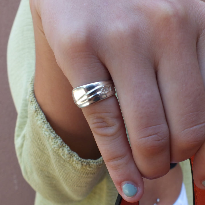 Spiral spoon ring on model's hand