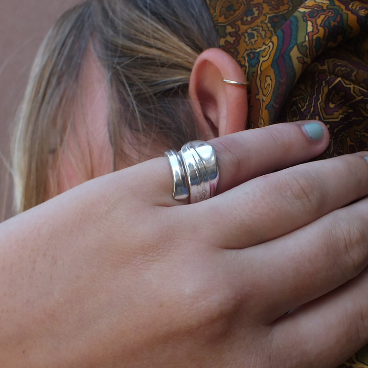 Spiral spoon ring on model's hand