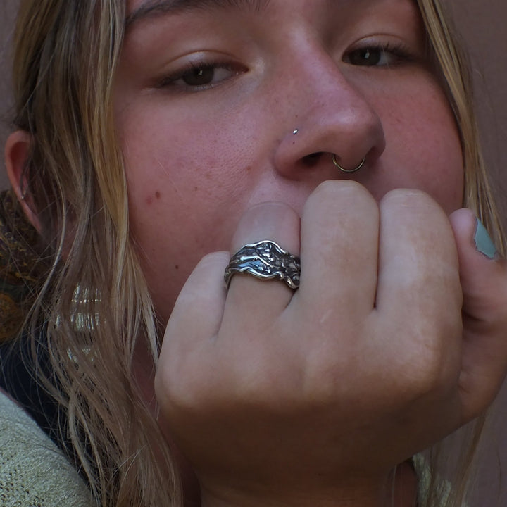 Spoon ring worn by model