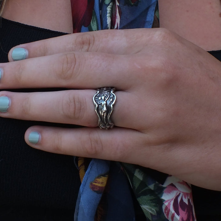 Spoon ring worn by model